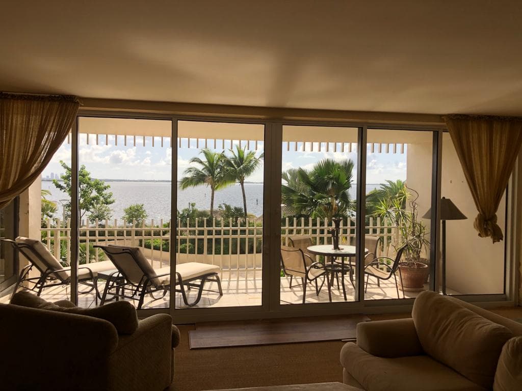 Large impact sliding glass door replacement on a Florida home in Broward County with hurricane rated glass panels and smooth glide track system